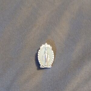 Graceful Silver Religious Brooch